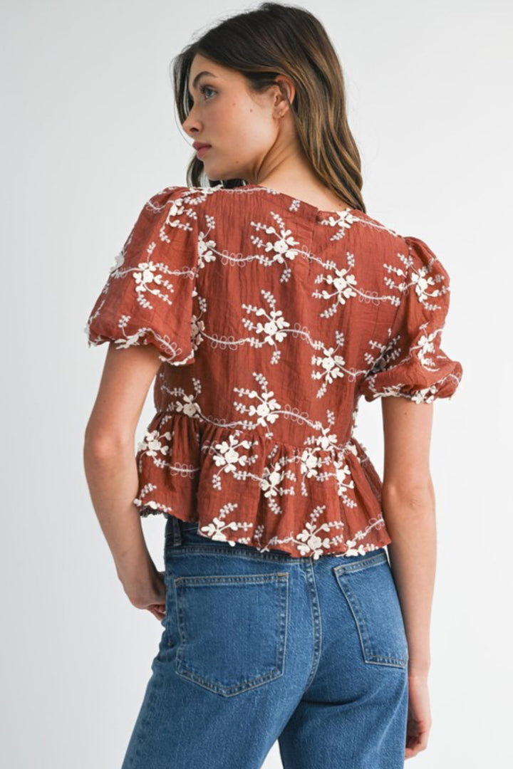 Embroidered Peplum Top