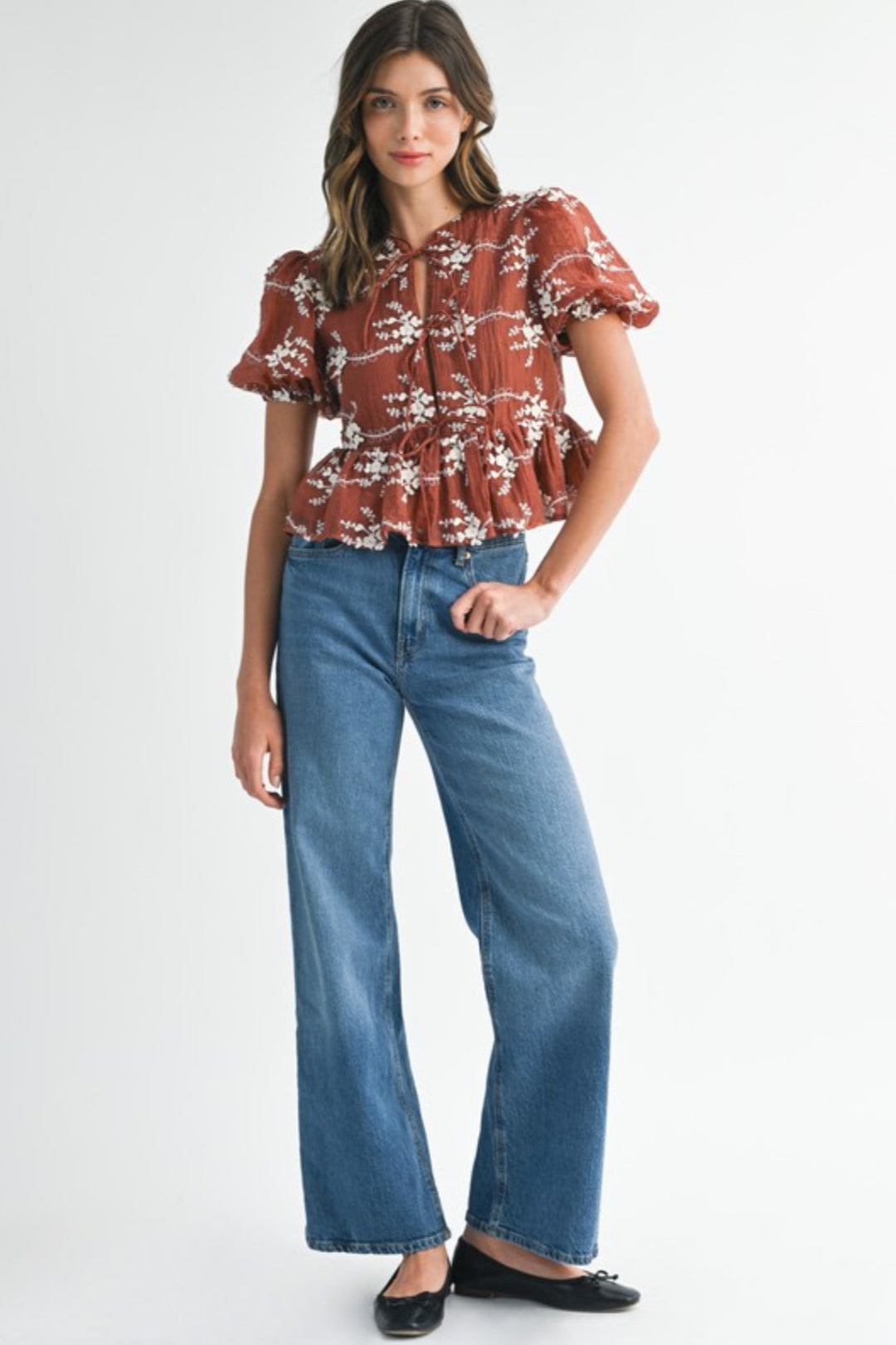 Embroidered Peplum Top