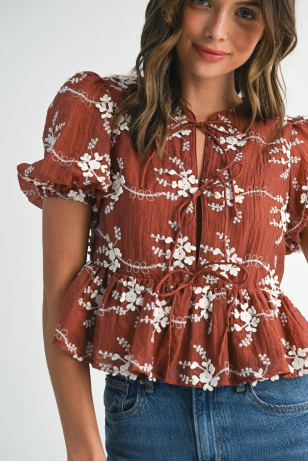 Embroidered Peplum Top