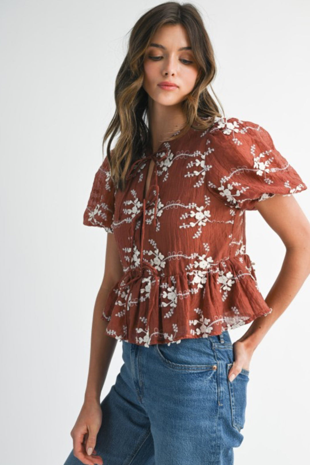 Embroidered Peplum Top